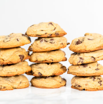 Baking cookies - Arina Photography Stack of homemade soft chocolate chip cookies.