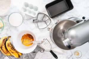 Baking banana bread - Arina Photography