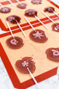 Lollipops - Arina Photography Making homemade berry flavor lollipops with snowflakes.