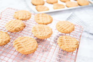 Peanut butter cookies - Arina Photography Cooling rack with freshly baked peanut butter cookies for even cooling