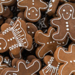 Gingerbread cookies decorated with white royal icing.