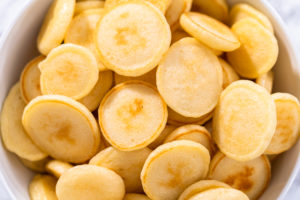 Mini pancake cereal - Arina Photography Bowl filled with plain golden mini pancakes, no toppings – freshly cooked mini pancakes ready to be topped or packed for snacks.
