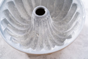 Greased metal bundt cake pan before adding batter