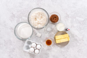 Flat lay of all cake ingredients arranged on counter
