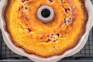Lemon cranberry bundt cake - Arina Photography Freshly baked lemon cranberry bundt cake in a bundt cake pan.