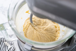 Baking brioche buns - Arina Photography Mixing ingredients in kitchen mixer to bake homemade brioche buns.