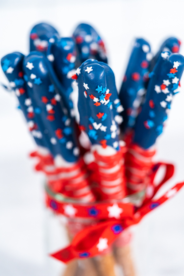 Chocolate-covered pretzel rods - Arina Photography