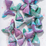 Homemade chocolate mermaid tails covered with glitter dust.