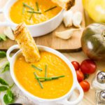Roasted tomato soup cooked with organic heirloom tomatoes and served with grilled cheese sandwich.