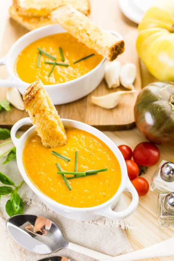 Tomato soup - Arina Photography Roasted tomato soup cooked with organic heirloom tomatoes and served with grilled cheese sandwich.