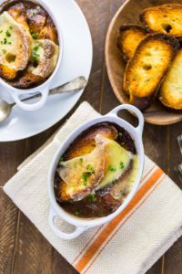 French Onion Soup - Arina Photography Homemade French onion soup with toasted baguette.