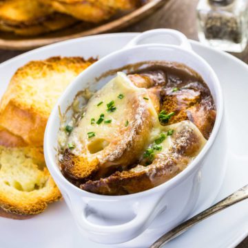 French Onion Soup - Arina Photography Homemade French onion soup with toasted baguette.