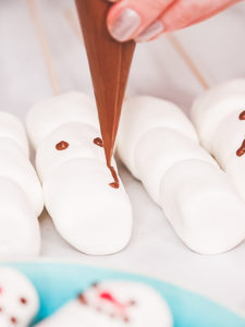 Marshmallow snowman and reindeer on sticks - Arina Photography