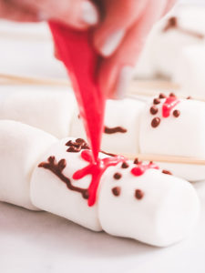 Marshmallow snowman and reindeer on sticks - Arina Photography