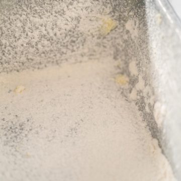 Greasing baking pan - Arina Photography