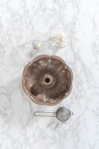 Greasing baking pan - Arina Photography