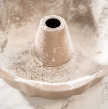 Greasing baking pan - Arina Photography