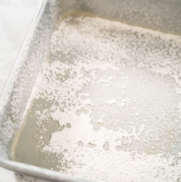 Greasing baking pan - Arina Photography