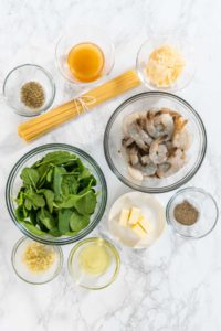 Garlic Shrimp Pasta with Spinach - Arina Photography