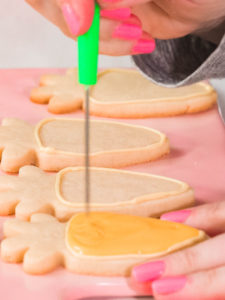 Making Easter cookies - Arina Photography Step by step. Flat lay. Decorating Easter sugar cookies with rotal icing.