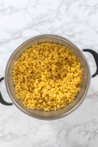 Macaroni and cheese with broccoli - Arina Photography