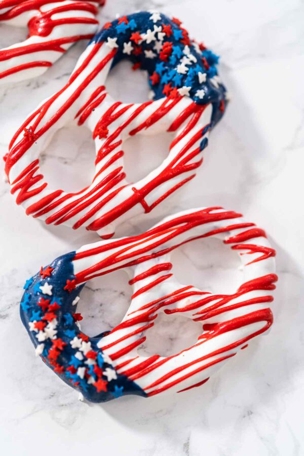 Red White and Blue Chocolate Covered Pretzel Twists - Arina Photography