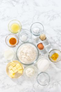 Lemon cupcakes - Arina Photography Group of ingredients for cupcakes and frosting shown together in small bowls.