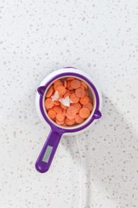 Halloween chocolate-covered pretzel rods - Arina Photography