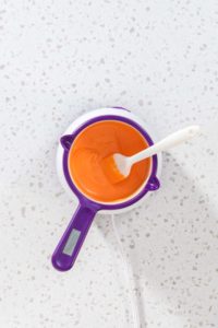 Halloween chocolate-covered pretzel rods - Arina Photography