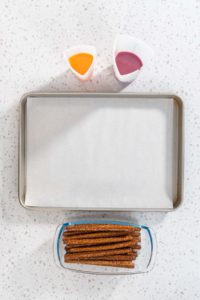 Halloween chocolate-covered pretzel rods - Arina Photography