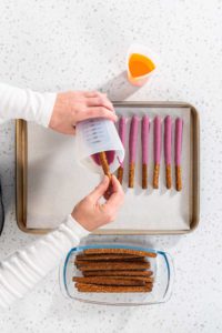 Halloween chocolate-covered pretzel rods - Arina Photography