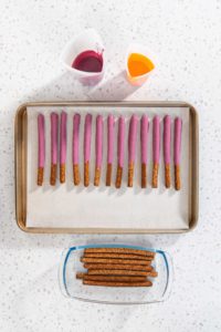 Halloween chocolate-covered pretzel rods - Arina Photography