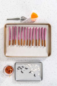 Halloween chocolate-covered pretzel rods - Arina Photography