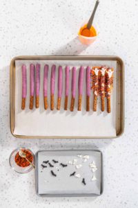 Halloween chocolate-covered pretzel rods - Arina Photography