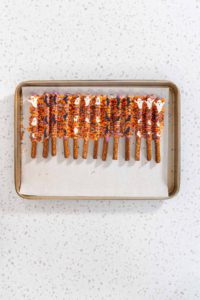 Halloween chocolate-covered pretzel rods - Arina Photography