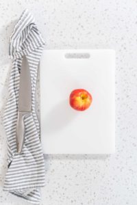 Sliced red apples - Arina Photography
