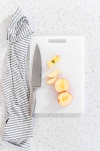 Sliced red apples - Arina Photography