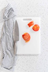Sliced red apples - Arina Photography