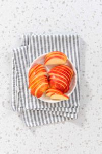 Sliced red apples - Arina Photography