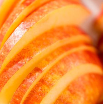 Sliced red apples - Arina Photography