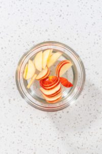 Sliced red apples - Arina Photography