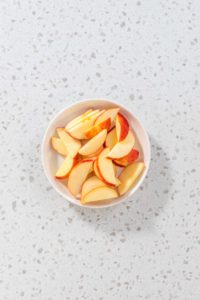 Sliced red apples - Arina Photography