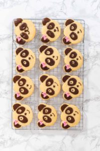 Panda shaped shortbread cookies with chocolate icing - Arina Photography