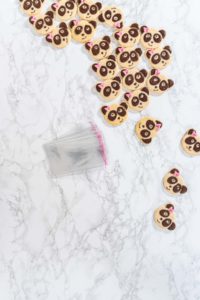 Panda shaped shortbread cookies with chocolate icing - Arina Photography