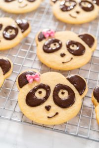 Panda shaped shortbread cookies with chocolate icing - Arina Photography