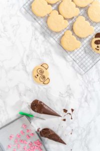 Panda shaped shortbread cookies with chocolate icing - Arina Photography