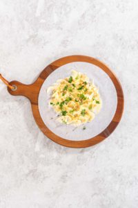 Butter board with vegetables and bread - Arina Photography