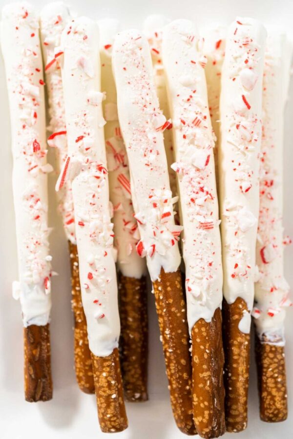Candy cane chocolate covered pretzel rods - Arina Photography