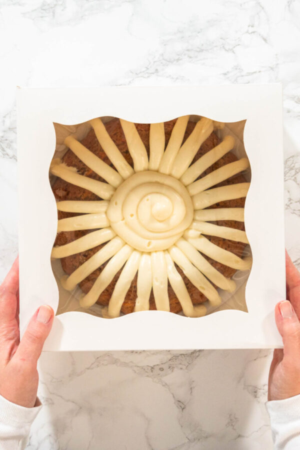 Sweet Treat: Carrot Bundt Cake in Paper Box - Arina Photography The Carrot Bundt Cake is carefully packaged into a white paper bundt cake box, ready for gifting or sharing.