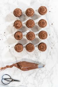 Baking Chocolate Cupcakes with Decadent Chocolate Frosting - Arina Photography